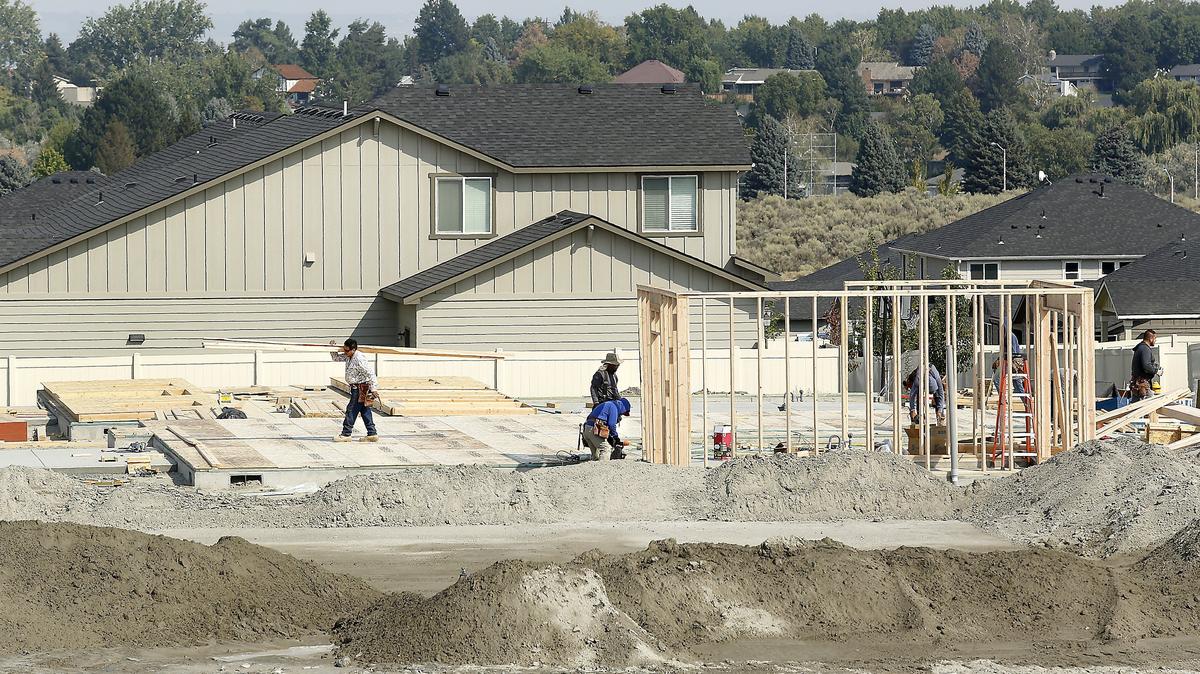 Tri-City home prices and values aren’t spiking but that’s not all bad news say real estate officials. These homes are under construction on Chelan Loop and Wishkah Drive in South Richland.