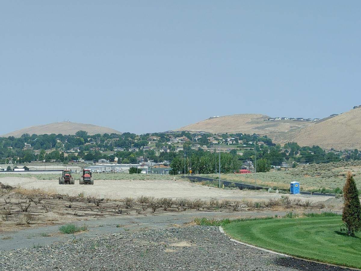 Property at 10519 Ridgeline Drive, near the West Clearwater/Leslie roundabout in western Kennewick and bordering Interstate 82, is being graded for future development.