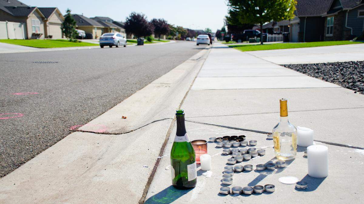 An impromptu memorial was left on the sidewalk in a west Pasco neighborhood in memory of Denali Anderson, a 20-year-old Kennewick man who was shot and killed at a party on Aug. 6, 2022.