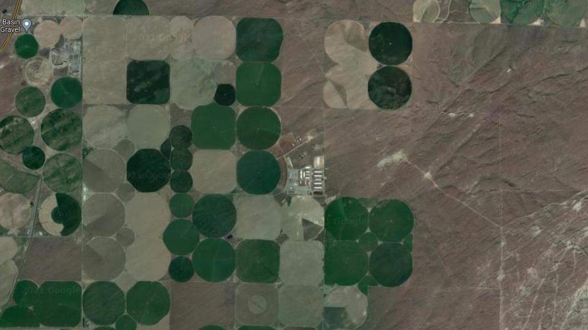Firefighters rescued a woman trapped in a pit by a auger in rural Franklin County.