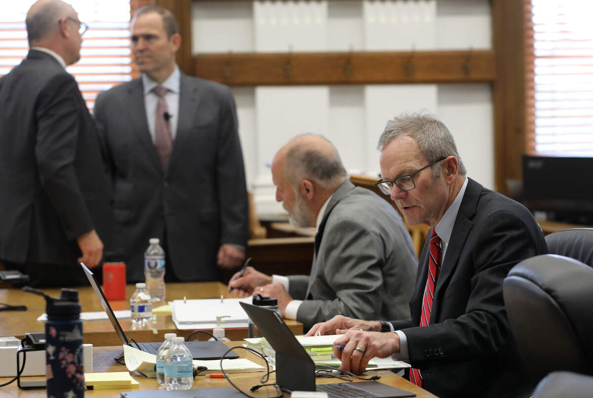 Benton County attorney Andrew Cooley, right, and plaintiff attorney team James Meade, Eron Cannon and Ronald B. Leighton, from left, prepare for the start of the second day of trial Thursday morning in a Walla Walla courtroom. A Walla Walla jury will decide if Benton County deputies deserve millions after alleged retaliatory conduct by the former sheriff tied to 2019 events and recall.