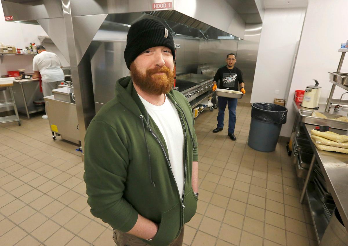 Michael Conger, 38, a resident at the Tri-City Union Gospel Mission in Pasco, stands in the state-of-art commercial kitchen that’s part of the new men’s facility recently opened by the organization. Watch a video at: tricityherald.com/video
