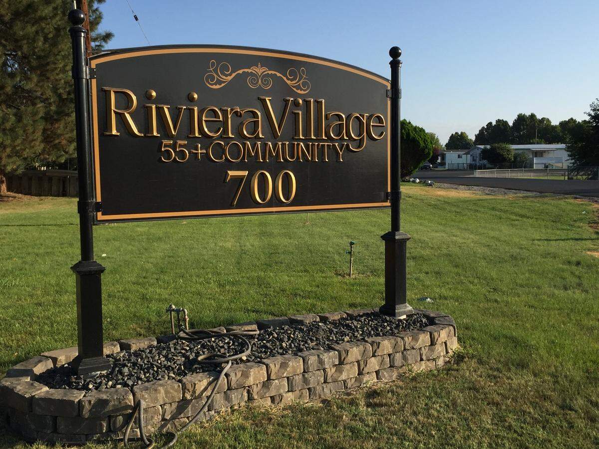 Pasco police arrested a woman after a man was found stabbed at Riviera Village mobile home park.