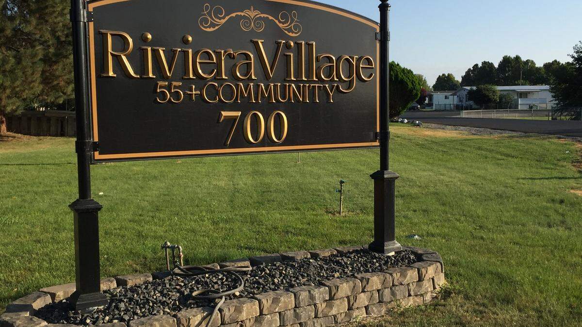 Pasco police arrested a woman after a man was found stabbed at Riviera Village mobile home park.