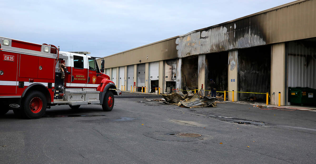 A Kennewick Fire Department remained on scene of Tuesday night’s fire he Garage Town rental storage unit complex at 725 N. Edison St. monitioring for hotspots.