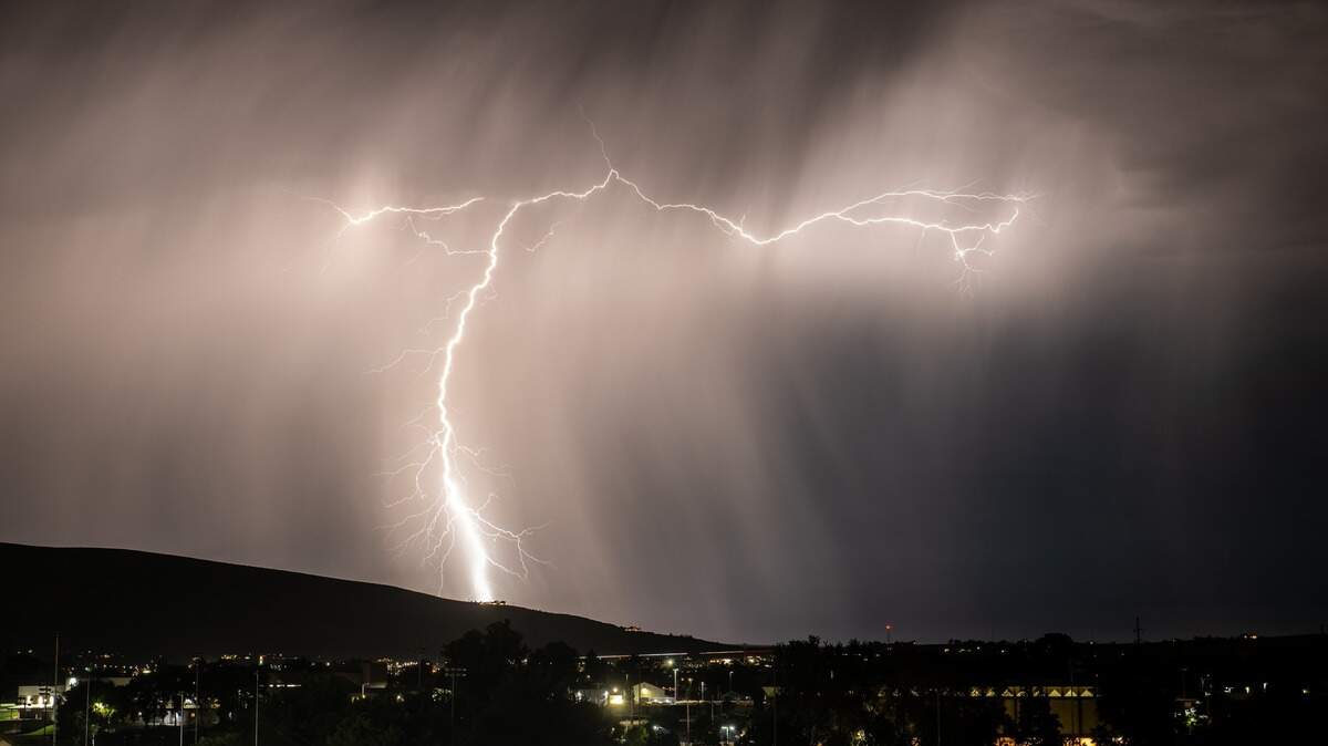 Lightning strikes south of Badger Mountain on Monday, Sept. 8, 2025, as seen from the parking garage at Kadlec Regional Medical Center in Richland.