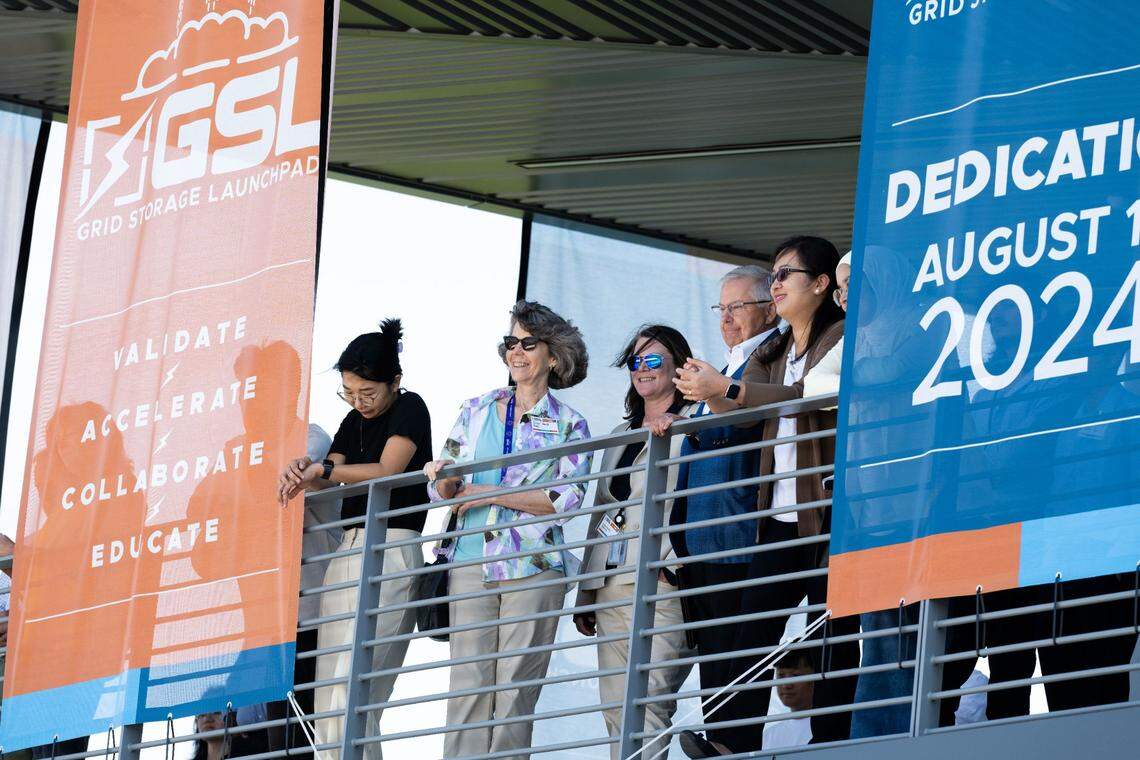 Researchers and staff at the Department of Energy’s new Grid Storage Launchpad at Pacific Northwest National Laboratory in Richland line the building’s balcony to hear remarks at an opening ceremony.