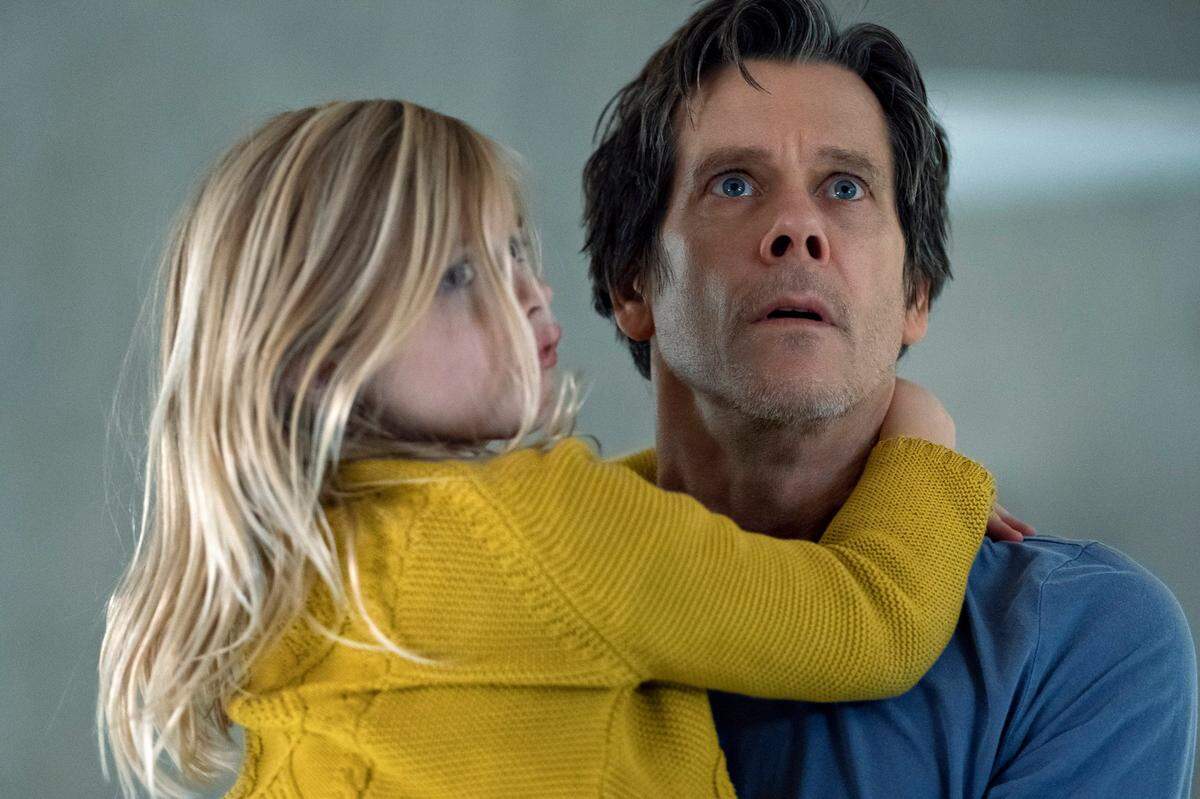 In this image released by Universal Pictures, Avery Essex, left, and Kevin Bacon appear in a scene from “You Should Have Left.”