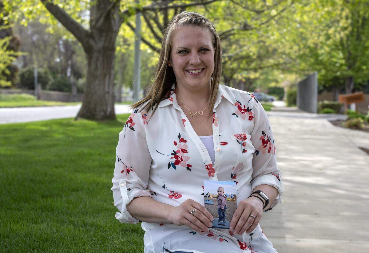Lisa Percifield holds a photos of her son, Gage, who was almost two-years-old when he died after he drowned in a hot tub at his babysitter’s house. Gage would have started kindergarten this August and in honor of him, Lisa wants to donate supplies to his class.