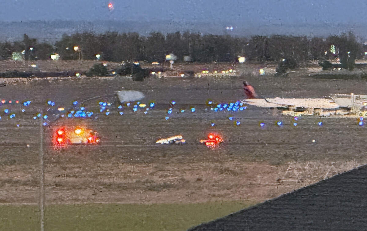 Pasco Fire Department vehicles respond to a plane emergency on a runway at the Tri-Cities Airport in Pasco