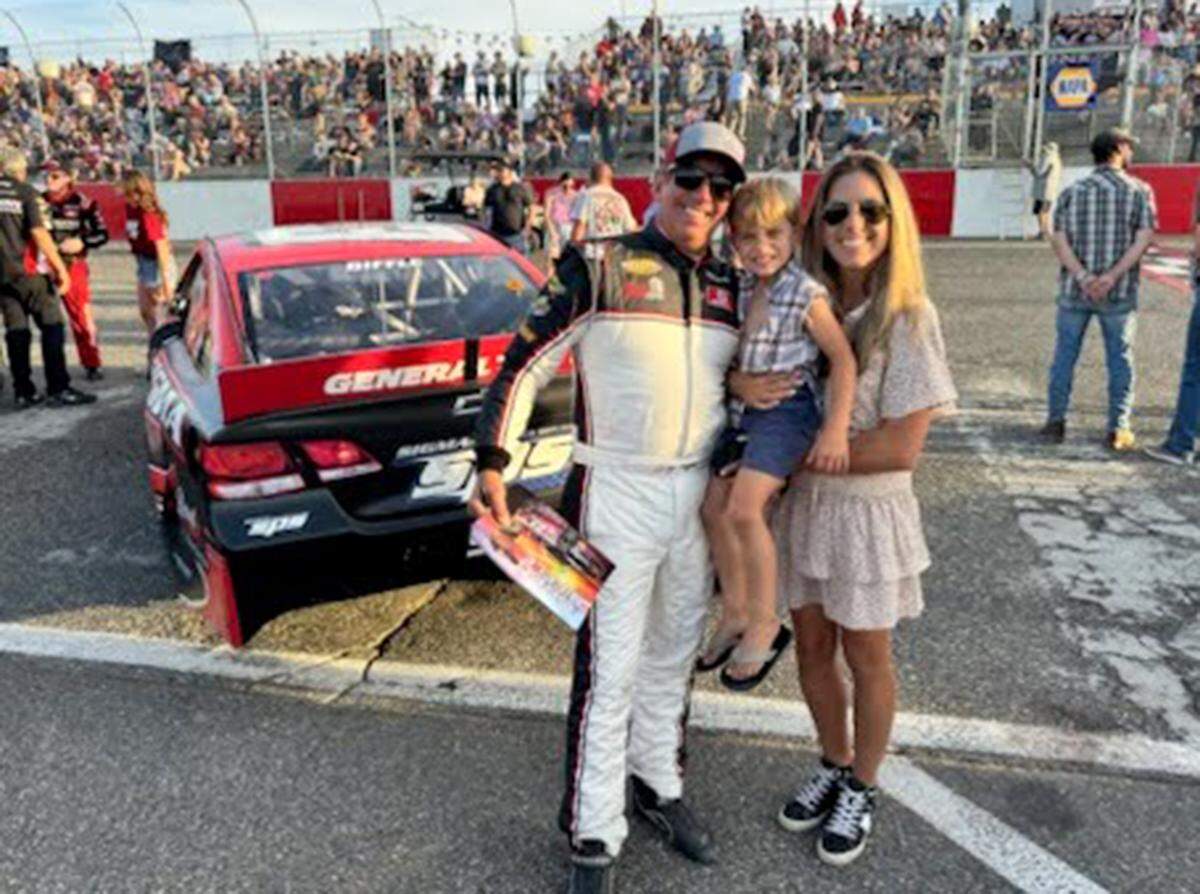 Greg Biffle poses for a photo with his wife Cristina and son Ryder after a race at Tri-City Raceway.