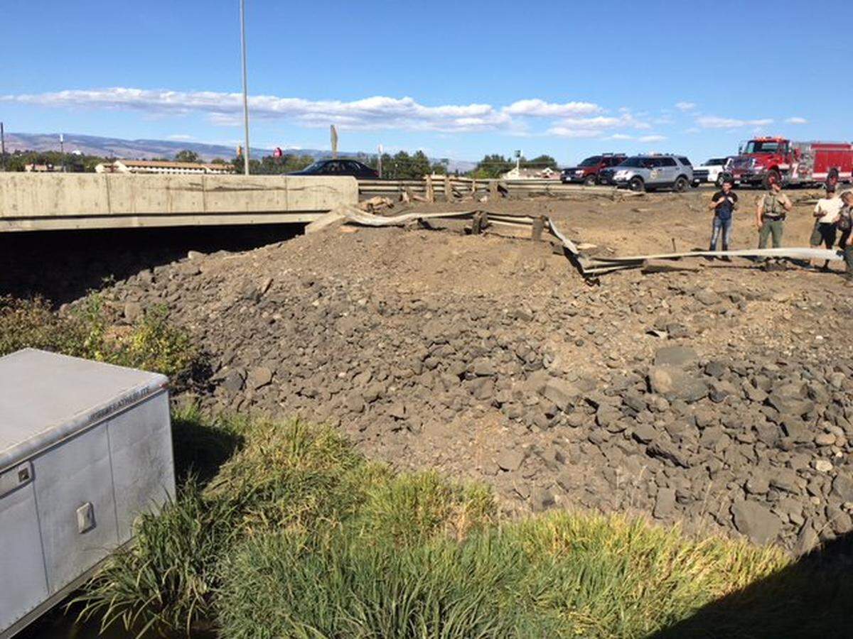 Troopers say the family was heading west toward Snoqualmie Pass in the thick of holiday traffic when a tire blew and the grandfather behind the wheel lost control, sending the motorhome through a guardrail and over an embankment.