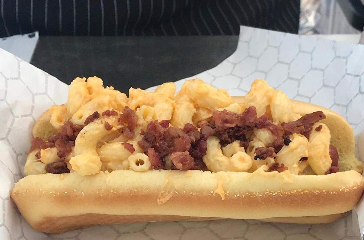 The Dogfather dog is an ode to a childhood favorite with mac and cheese heaped on top of a beef hot dog with bacon crumbles.