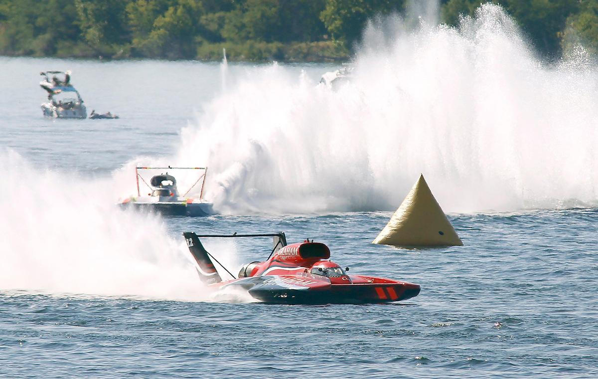 J. Michael Kellly races the U-12 Graham Trucking unlimited hydroplane to a Columbia Cup championship Sunday in front of Andrew Tate in the U-1 Delta/RealTrac hydroplane on the Columbia River.