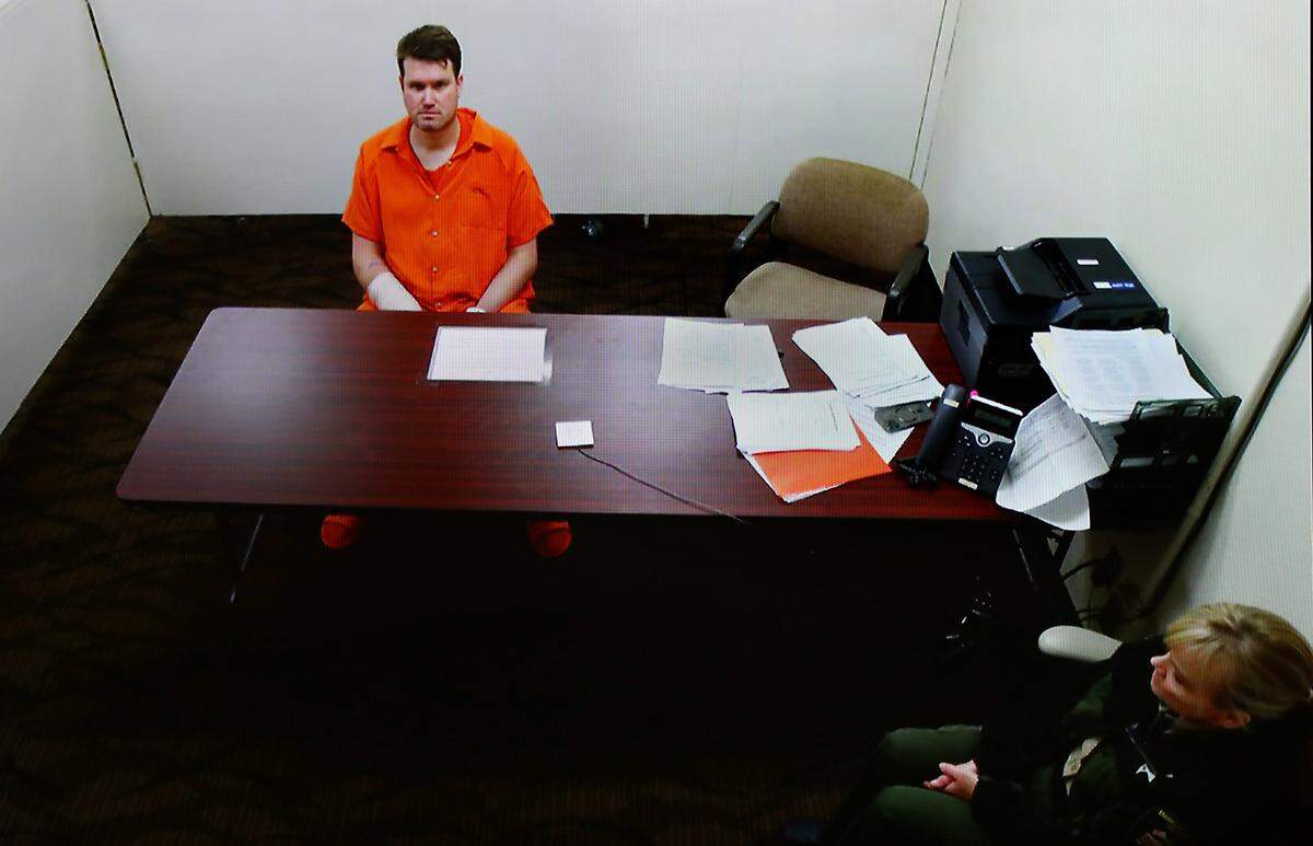 Zachary N. Schwartz, 37, of Yakima, makes his preliminary appearance in Franklin County Superior Court on Monday via a video link from the Franklin County Jail in Pasco.