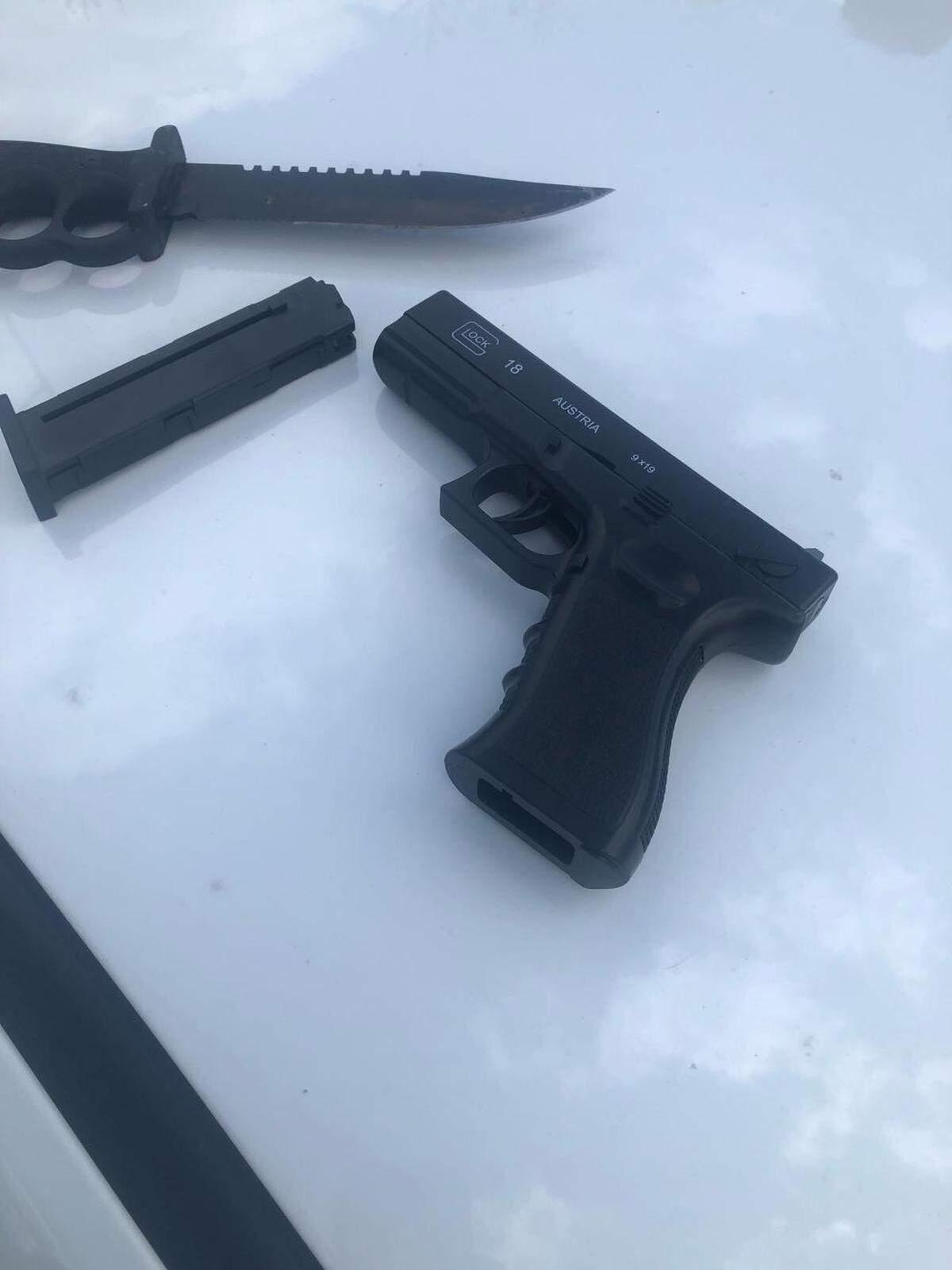 Kennewick police found a realistic looking fake handgun inside the car of a man accused in a road rage confrontation.