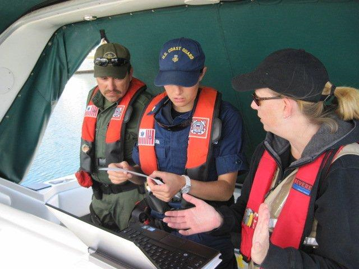 PNNL’s Melanie Godinez (center) and her colleagues coordinate training and dock-side drills for first responders to support a regional capability to deter the potential for illicit movement of radioactive materials within, and potentially through, the Puget Sound maritime environment.