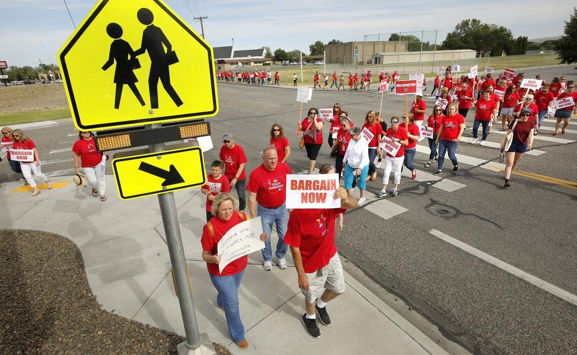 The Kennewick School Board planned to vote Wednesday evening on whether to open teacher contract negotiations to the public. This rally was in May when teachers urged the school board to increase salaries.