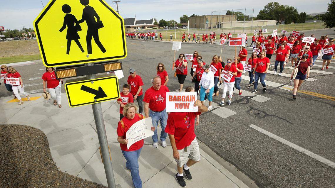 The Kennewick School Board planned to vote Wednesday evening on whether to open teacher contract negotiations to the public. This rally was in May when teachers urged the school board to increase salaries.