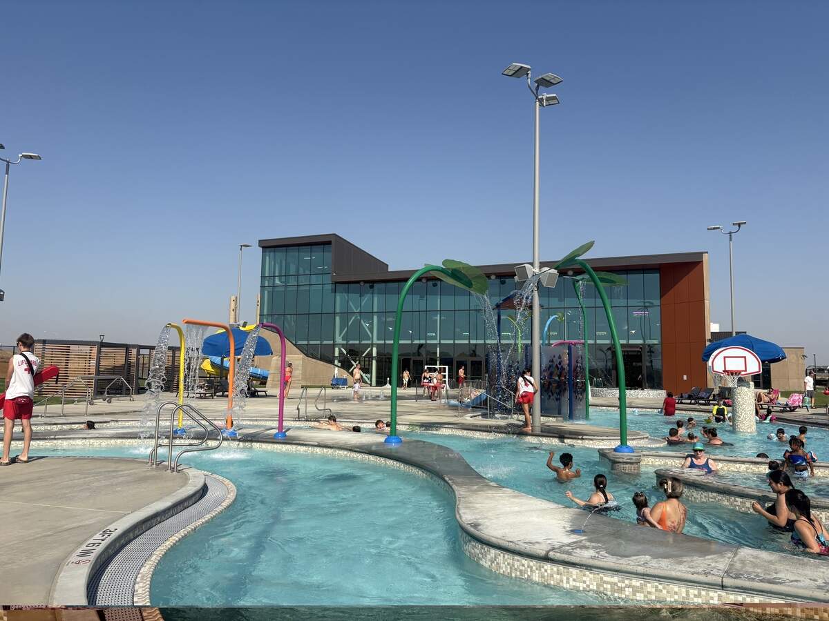 The Pasco Aquatic Center outdoor area has a lazy river, climbing wall and basketball hoops.