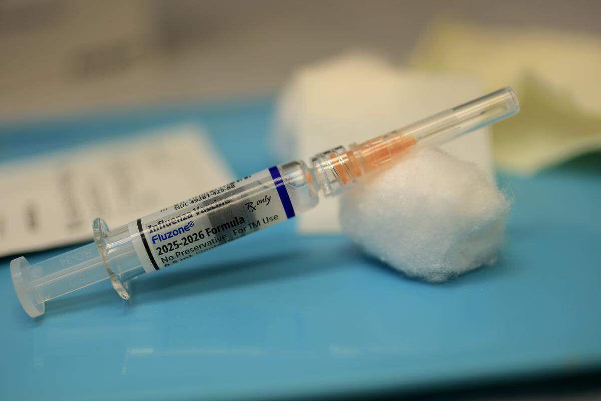 CORAL GABLES, FLORIDA - SEPTEMBER 12: An Influenza Vaccine is prepared for a patient at Doctor Gary M. Kramer, MD, PA's Pediatric office on September 12, 2025, in Coral Gables, Florida. The Florida Department of Health recently released information on the development of rulemaking to revise immunization and document requirements for school entry. (Photo by Joe Raedle/Getty Images)