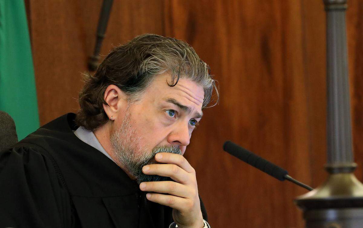 Walla Walla Superior Court Judge Brandon Johnson conducts Wednesday's court hearing at the Franklin County Courthouse in Pasco.
