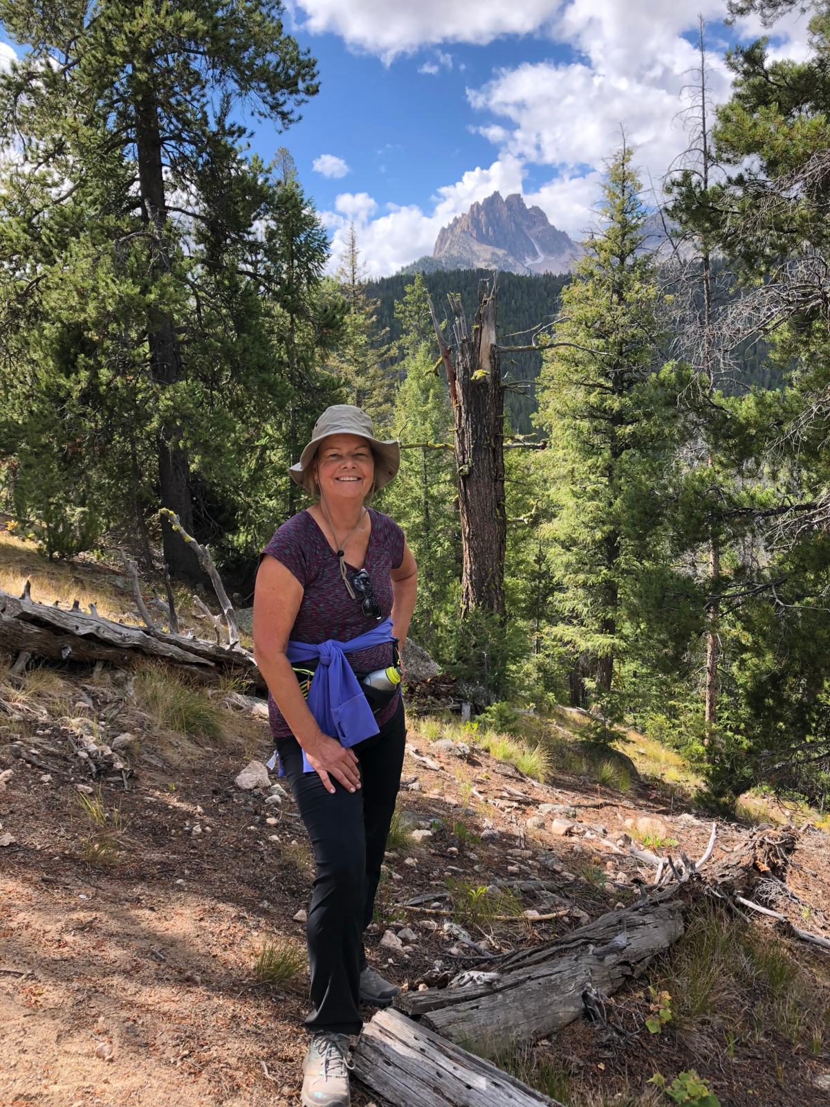 Breast cancer survivor Kristi Privette of Richland hikes a trail this summer in the Sawtooth wilderness near Red Fish Lake, Idaho.