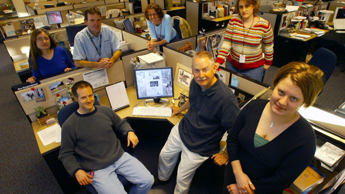 Ken Hoopengarner, center front, and the Tri-City Herald copy desk in 2006.