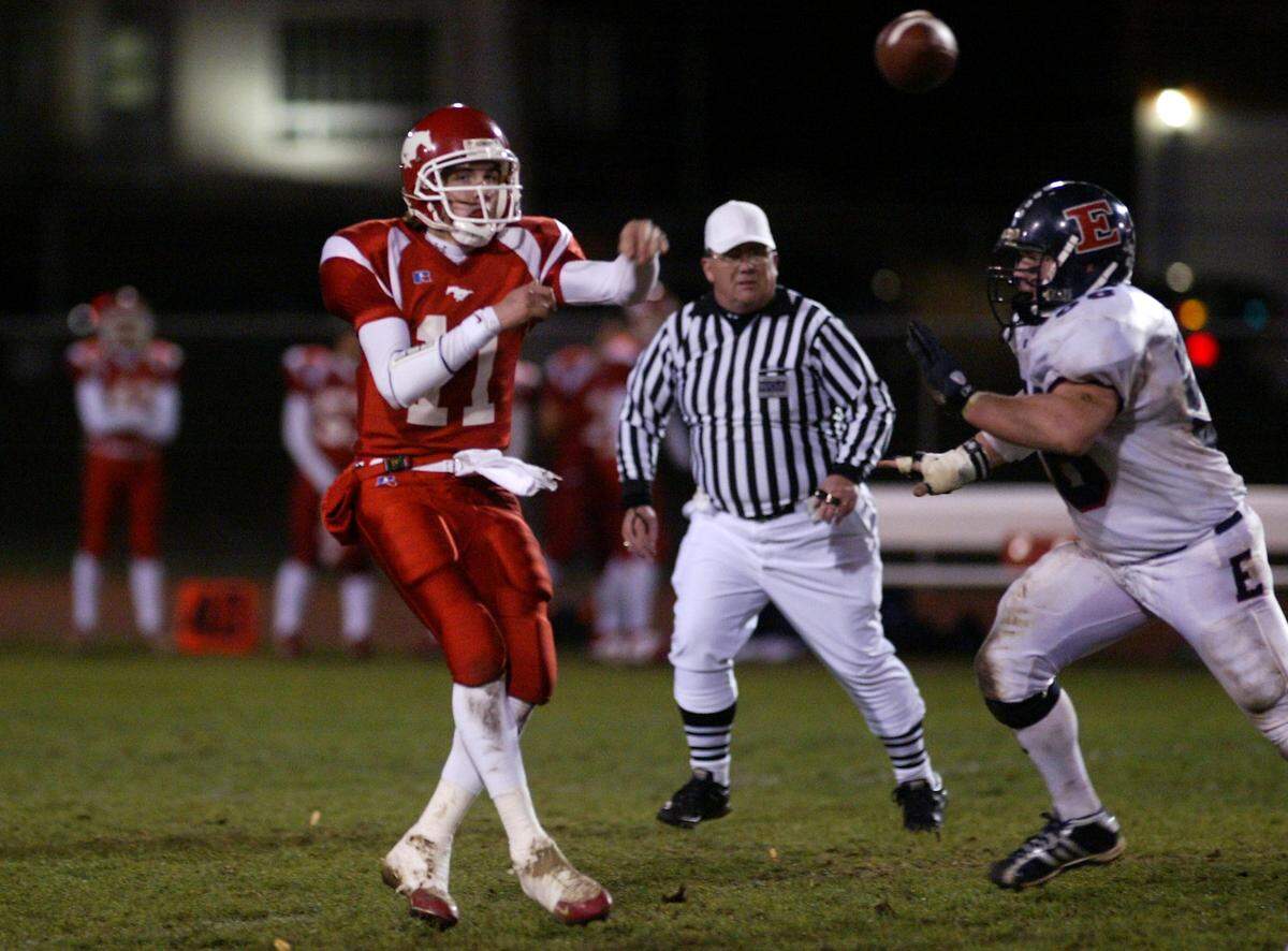Prosser quarterback Kellen Moore delivers a pass against Ellensburg during their 2005 game in Prosser.