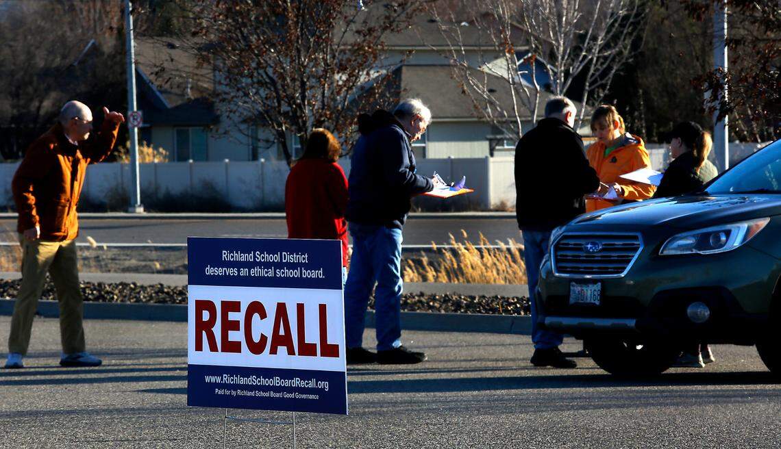 Richland School District voters lined up Feb. 15 in south Richland to sign three separate petitions for the recall of three Richland School Board members.