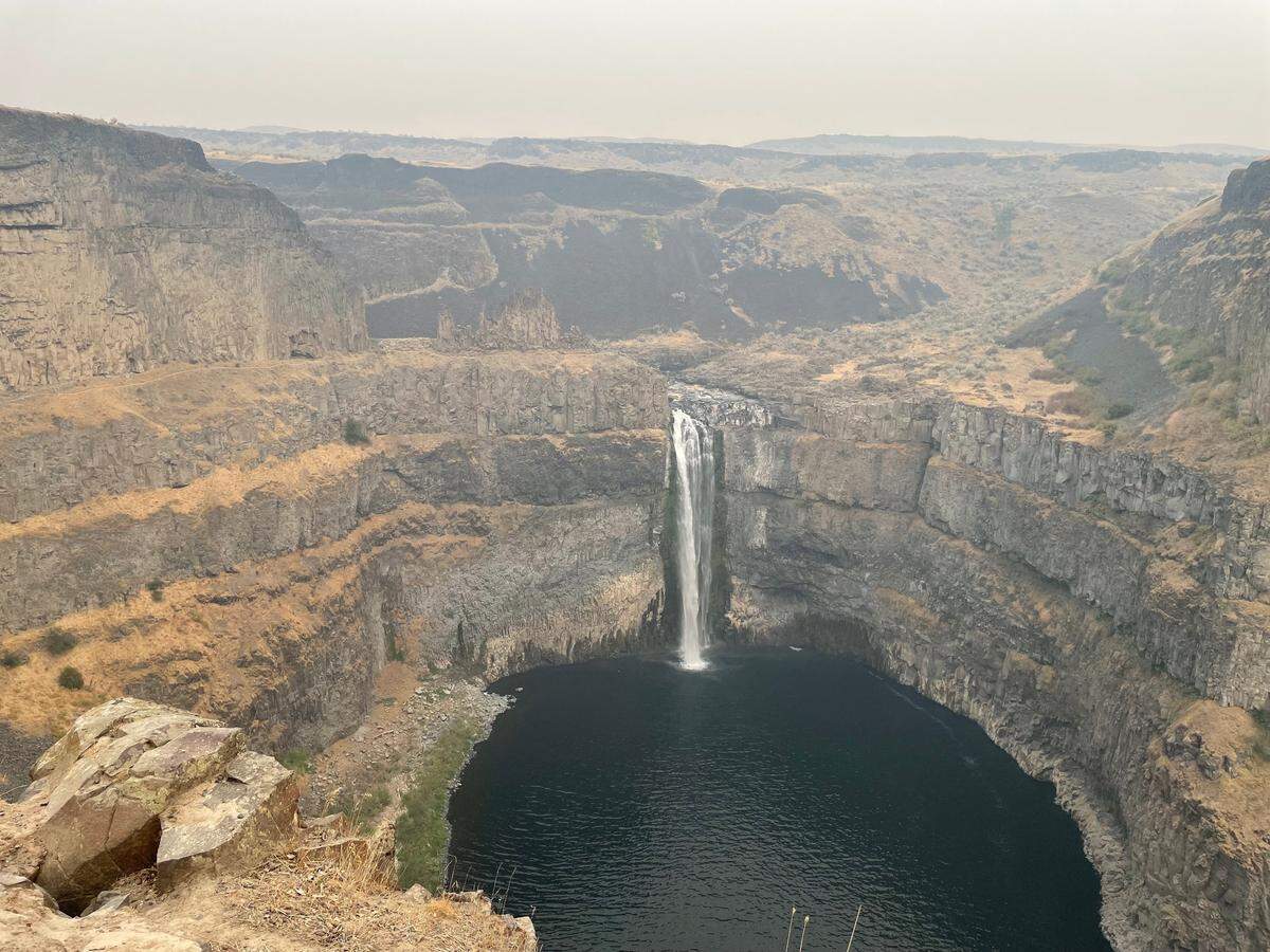 Smoke from two large wildfires near Spokane clogged the air near Palouse Falls State Park in Franklin County over the weekend.