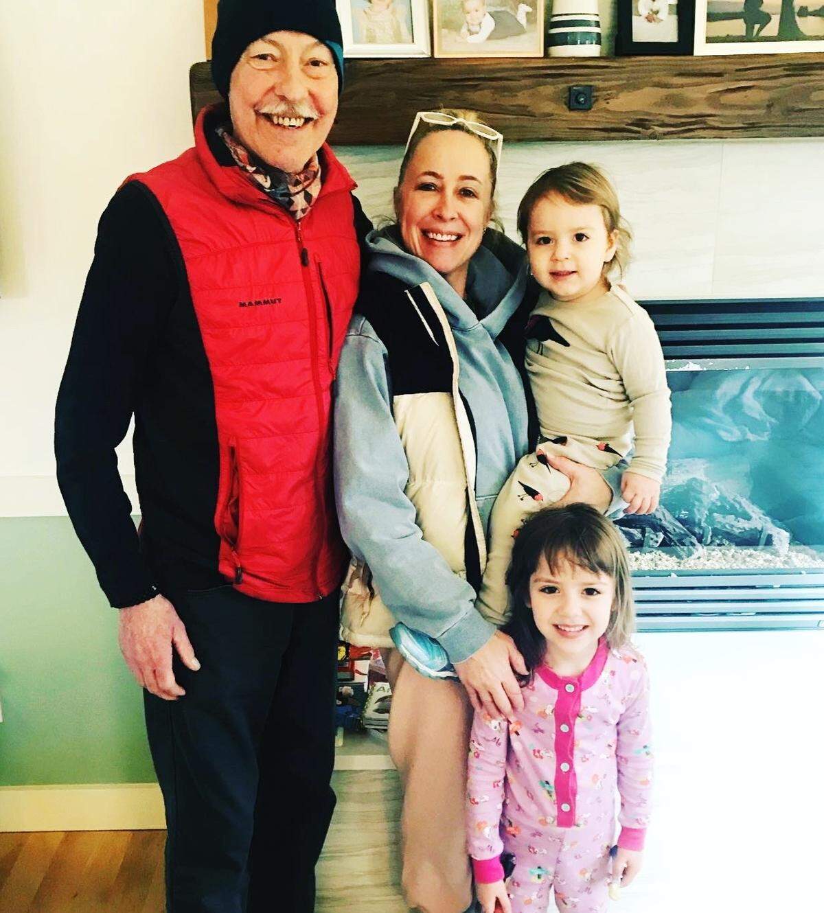 John, wife Dawn, and granddaughters Ivy and Eden.