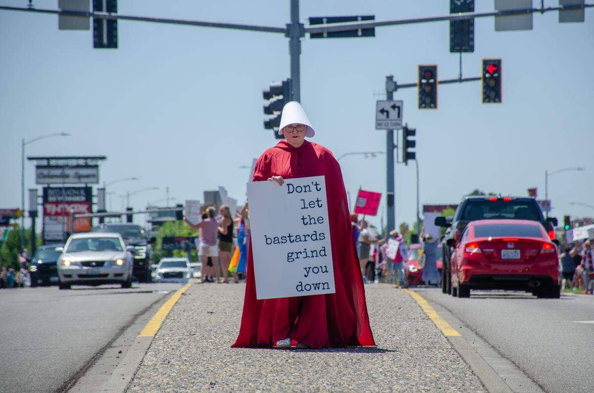 Thousands gathered Saturday, June 14, along Columbia Center Boulevard in Kennewick, Washington, for the nationwide “No Kings” protest. They demonstrated against President Donald Trump’s policies and against arrests made in the Hispanic community by U.S. Immigration and Customs Enforcement, or ICE.