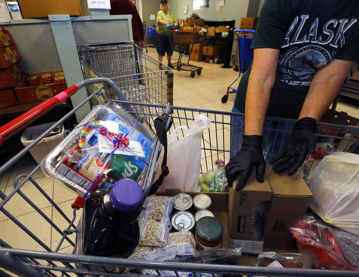 This cart for a  family of 15, with 7 adults and 8 children, made a special request for birthday cake makings for a 13-year-old. 