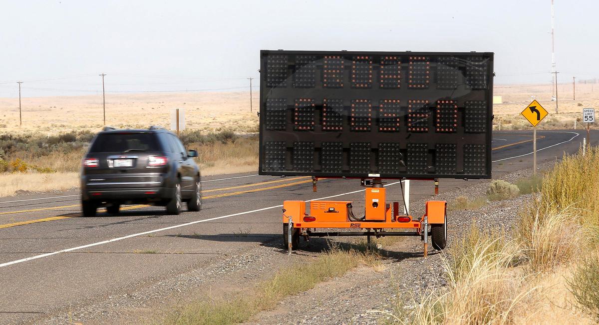A message board warns motorists of the pending closure, in October, of a section of George Washington Way in north Richland near the Pacific Northwest National Laboratory complex.