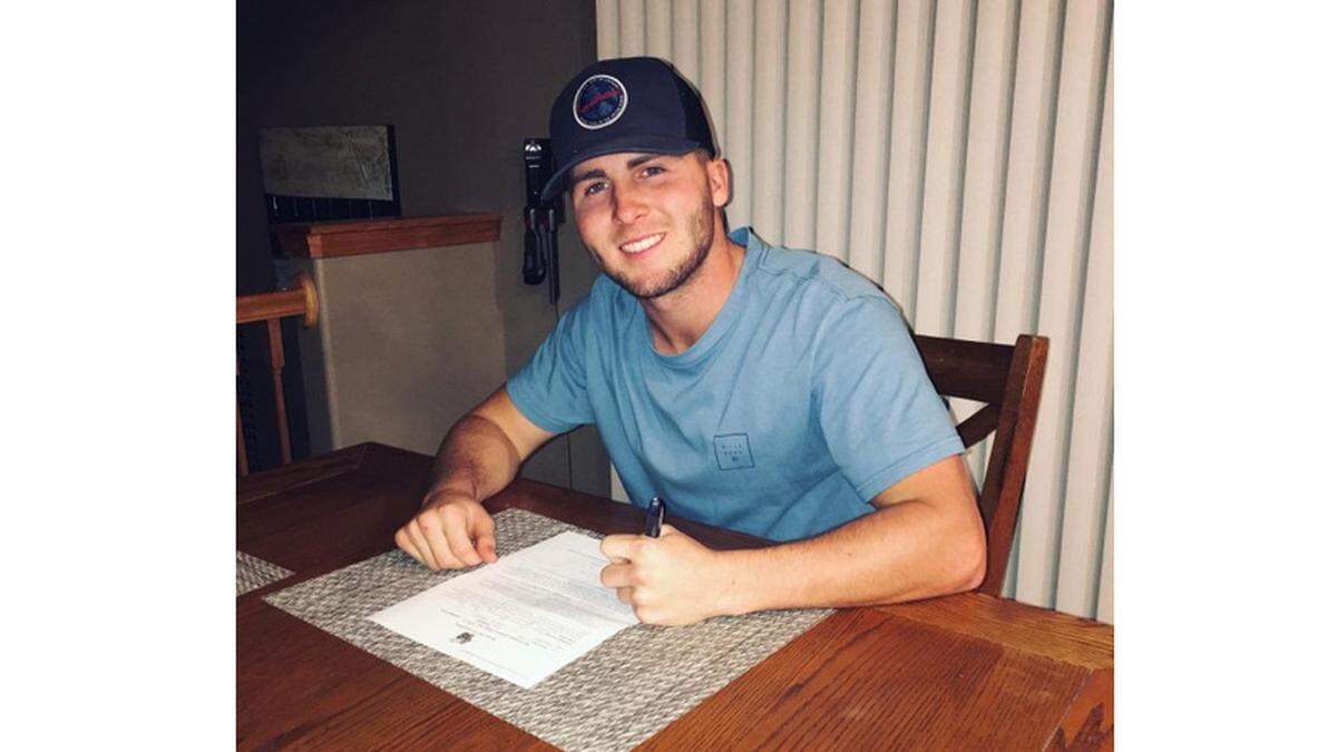 Kamiakin grad Carson Green, getting ready to sign his national letter of intent to play baseball for Montana State University Billings.