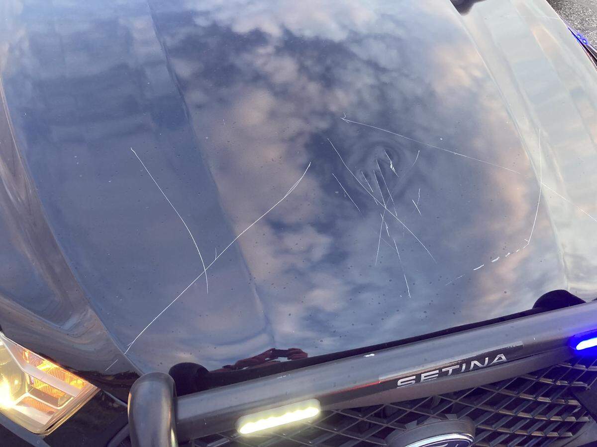 Kennewick police say Christoffer Pearson damaged the hood of a patrol vehicle with a knife before stealing another police car and leading officers on a high speed chase across the Tri-Cities.