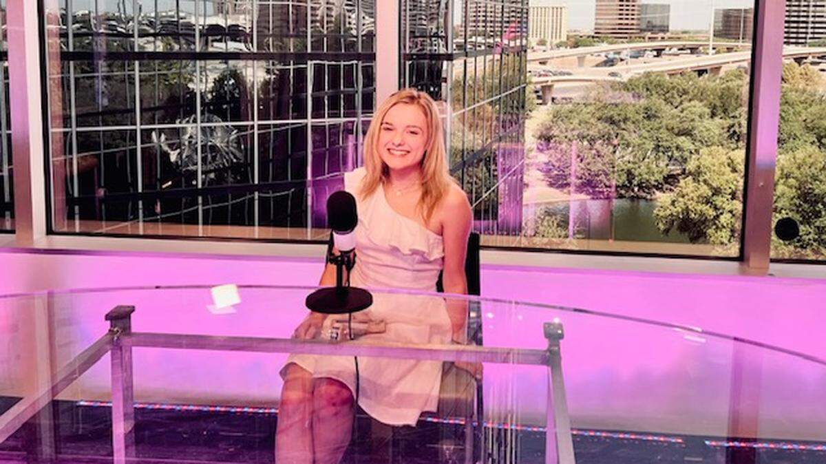 Hanford High School freshman Kellyanna Brooking smiles for a photo on the set of her political talk show, “A Few Words.” She hopes to give a voice to her generation and highlight the need for women in media. 