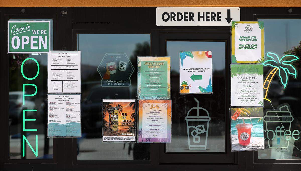 Menus and monthly special printouts are post on the walkup order window at  Tropical Express Coffee and Drink Bar at the store's location on West Skagit Avenue in Kennewick.