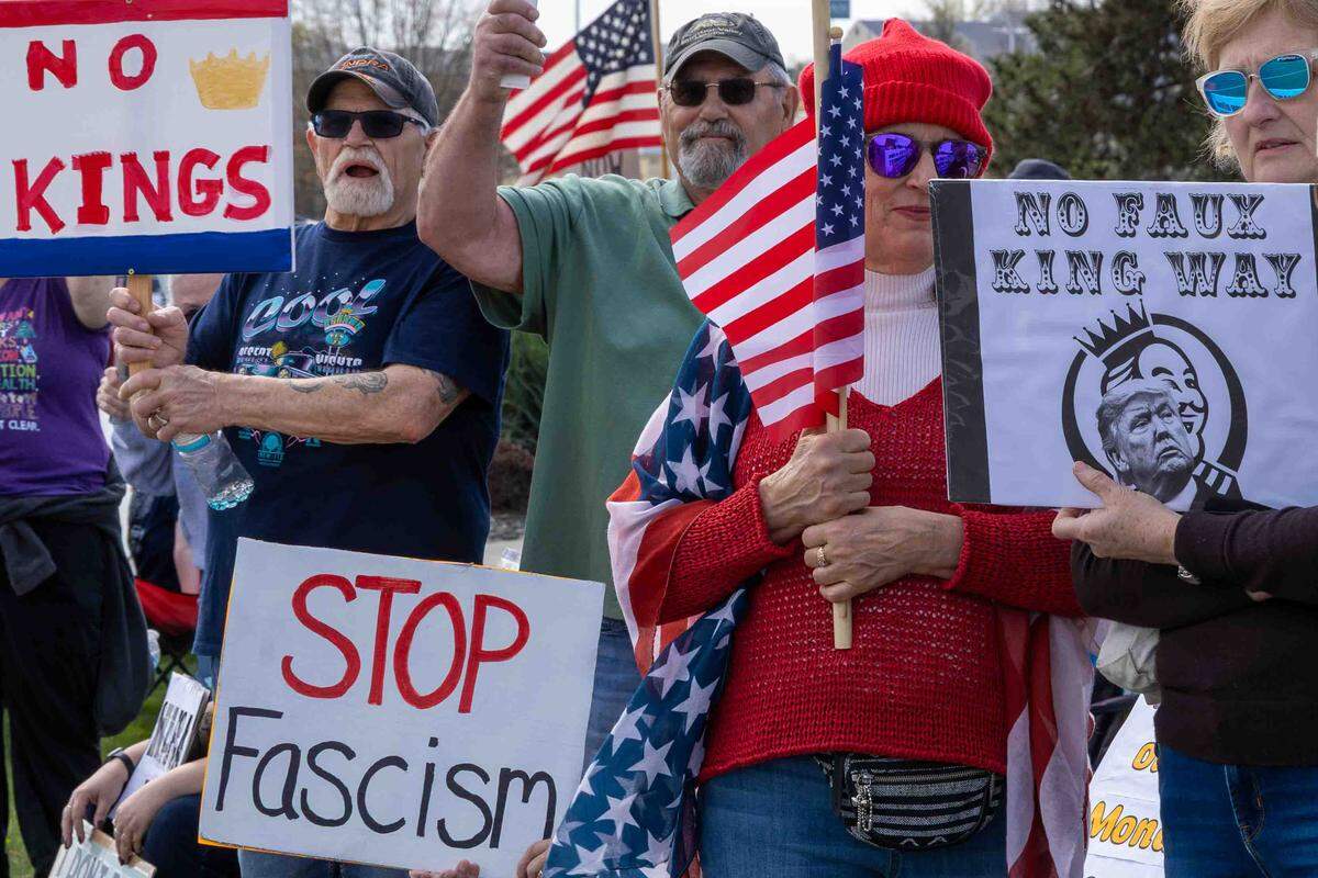 Demonstrators attend Saturday’s “No Kings” protest in Kennewick, protesting the Trump Administration and its military escalation in Iran. It drew about 3,000 protesters.