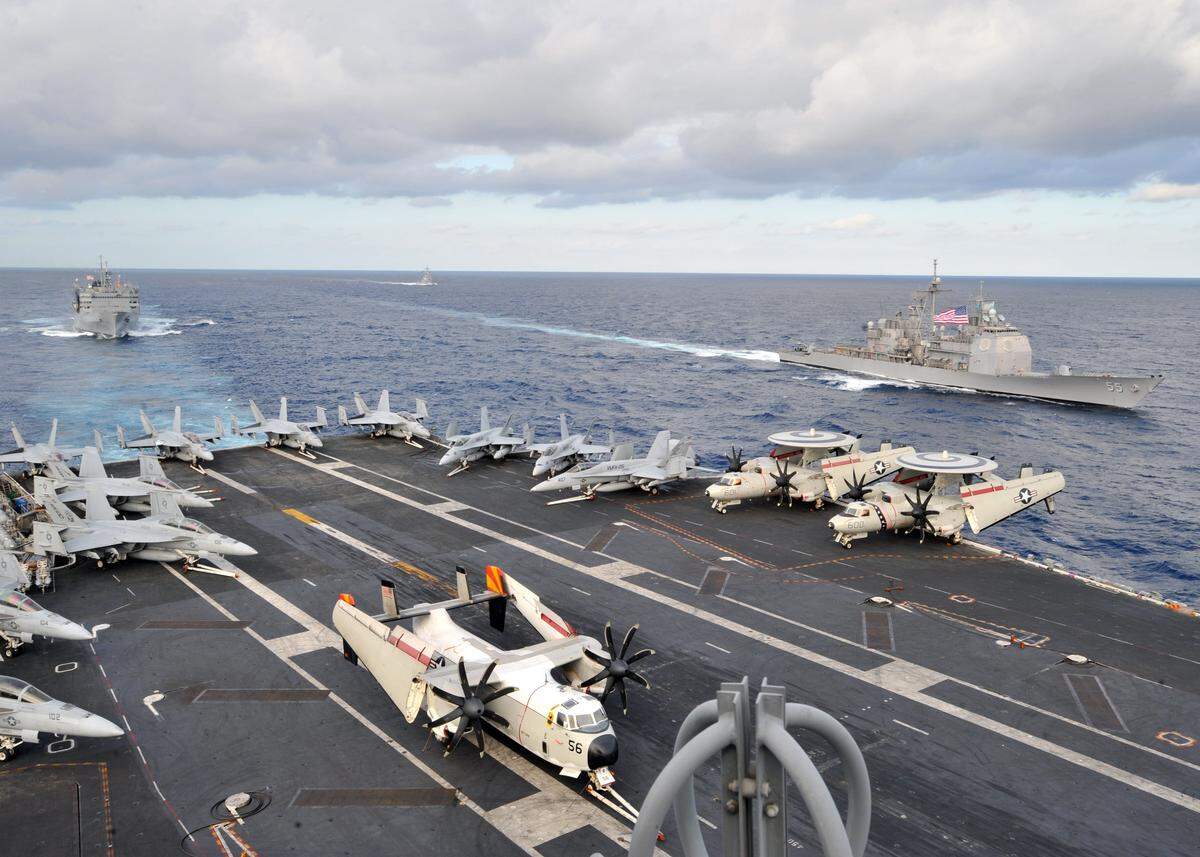 Ships from the Enterprise Carrier Strike Group were underway with the aircraft carrier USS Enterprise (CVN 65) in the Atlantic Ocean in January 2011.