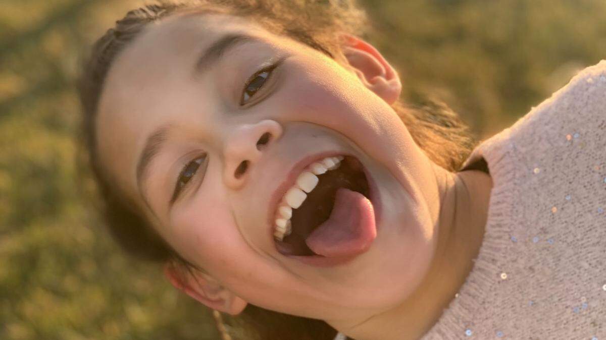 Trinity Enriquez, 11, shown goofing around outdoors, was hit by a pickup truck on Friday, Oct. 22.