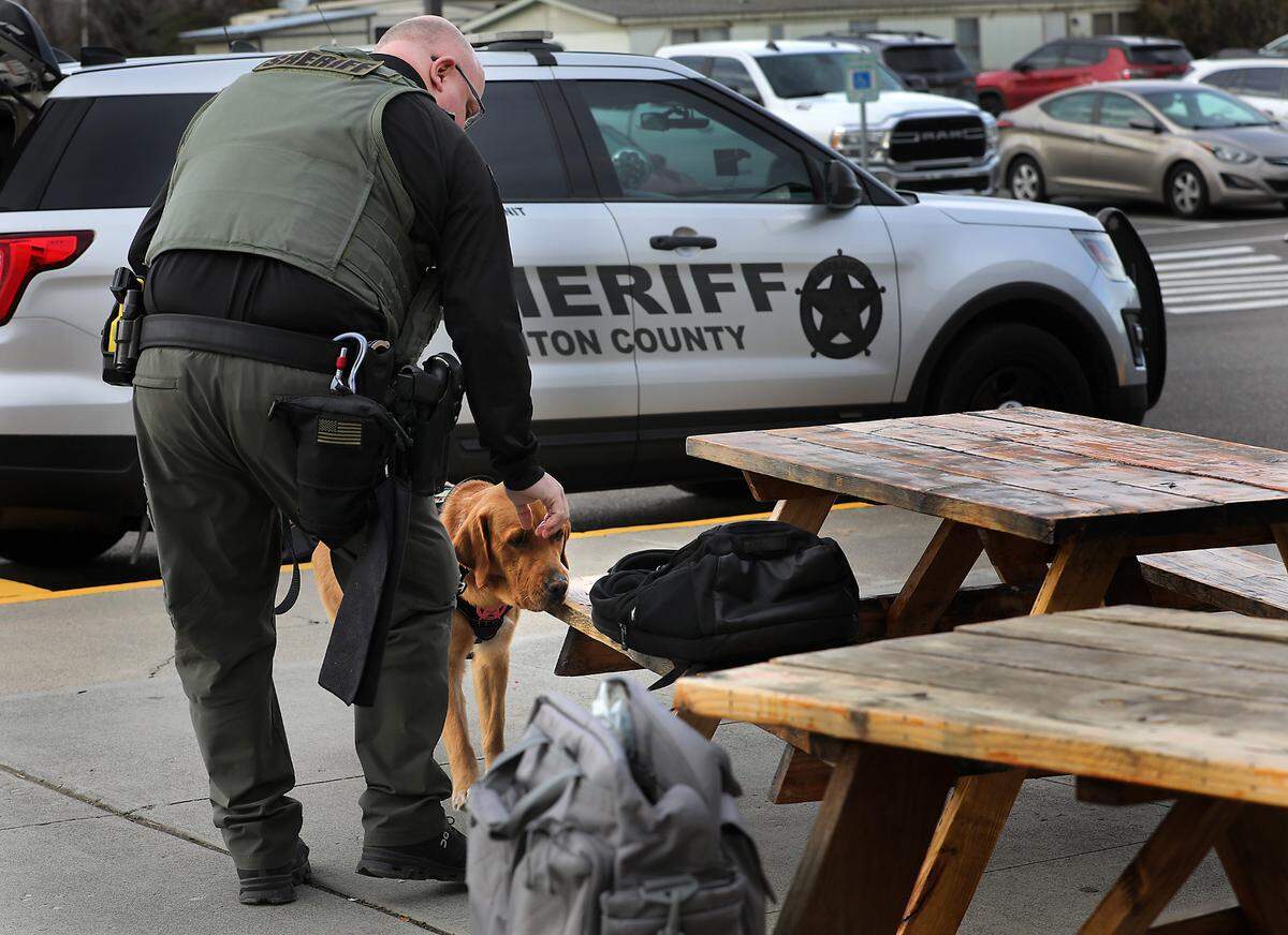 Benton County deputy Brett Hansen, the school resource officer at River View High School in Finley, is the handler of the agency’s newest K9 officer named Blaze. Hansen demonstrates how the lab/golden retriever mix is trained in finding hidden electronic devices. Blaze will primarily be used in the regional Internet Crimes Against Children task force.