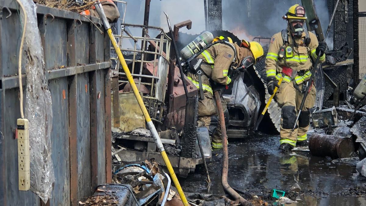 A section of Columbia Drive near downtown Kennewick was closed for a couple hours Sunday afternoon while firefighters handled a fire that started in a backyard shed and threatened nearby homes and businesses.