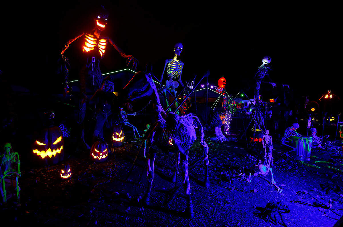 Skeletons, spiders, and all kinds of spooky decorations are displayed for Halloween in front of this home at 1914 S. Rainier St. in Kennewick.