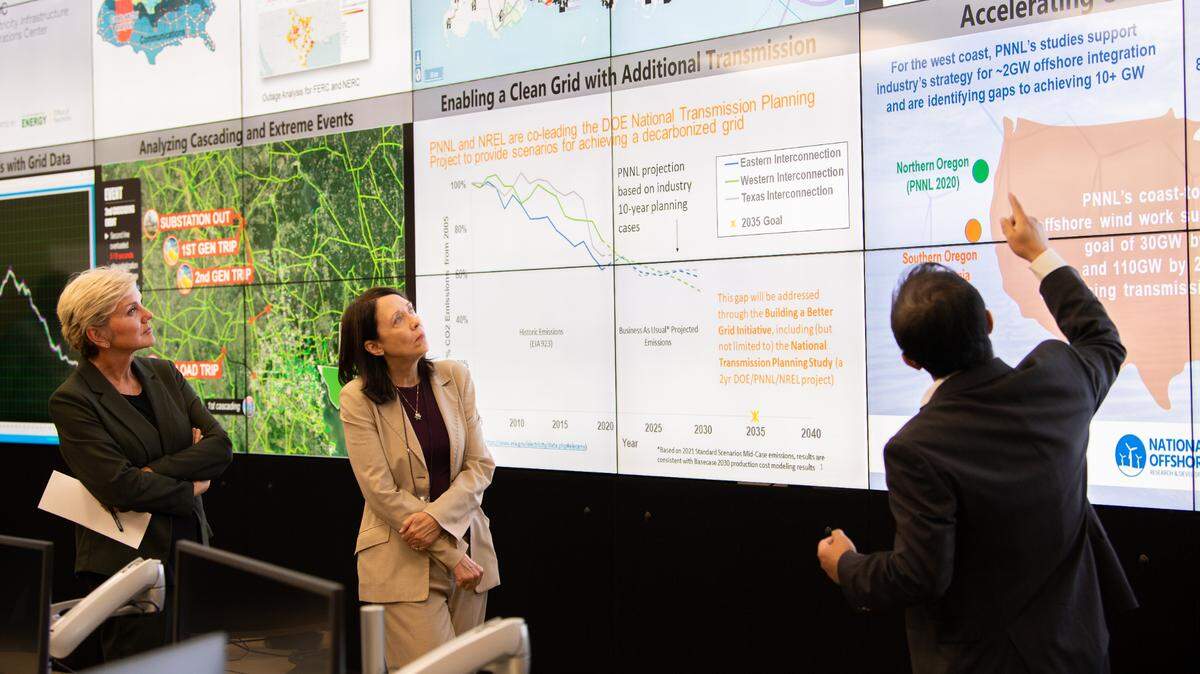 U.S. Energy Secretary Jennifer Granholm, left, made her first visit to Pacific Northwest National Laboratory in Richland on Thursday with Sen. Maria Cantwell, D-Wash. The tour included the lab’s Electricity Infrastructure Operations Center, where PNNL researchers work to improve managing the power grid.