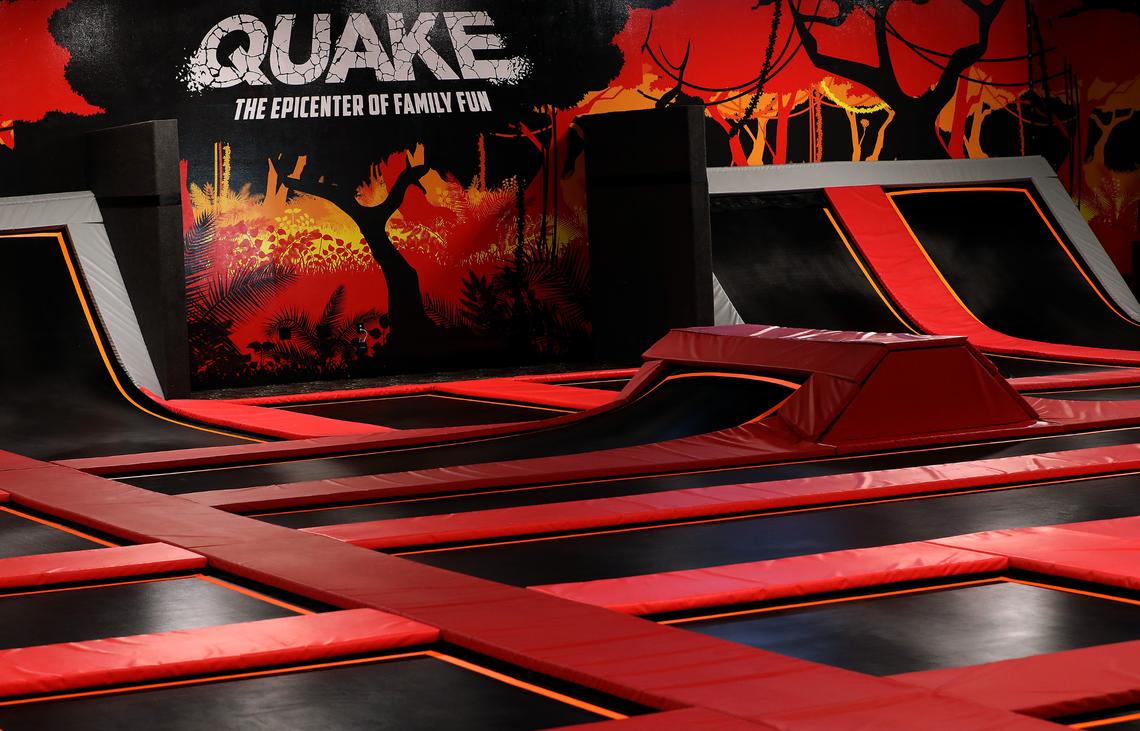 Bright colors and bold graphics decorate the trampoline deck in the 40,000 square-foot Quake Family Fun Center in west Kennewick. The dinosaur-themed indoor park is packed with trampolines, laser tag, video arcade, golf simulators, ninja course, bar, snack bar, toddler area and more.