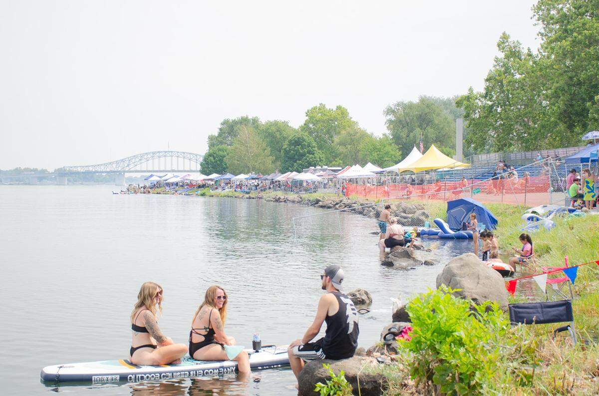 Crowds relax on the river Saturday, July 27, during the 2024 Water Follies Apollo Columbia Cup and STCU Over-the-River Air Show. The weekend marked the 59th time Unlimited hydroplanes raced on the Mid-Columbia River.