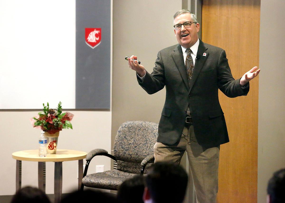 President Kirk Schulz of Washington State University shares a light moment with a faculty member during his town hall meeting Wednesday morning at the Tri-Cities branch campus in Richland. Watch videos at: tricityherald.com/videos