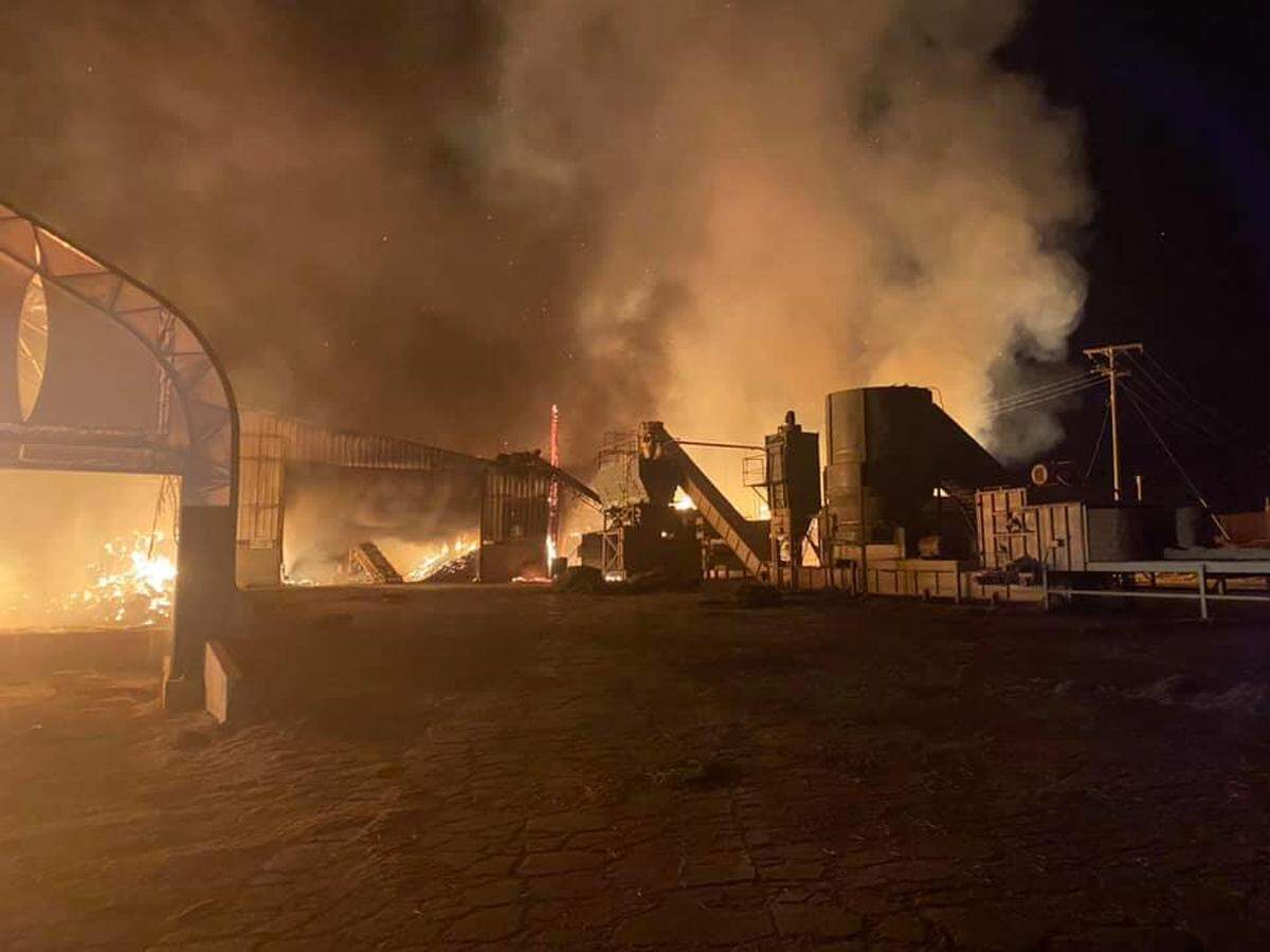 A hay processing facility burned early Tuesday northeast of Basin City. Firefighters were able to contain the fire to the building.